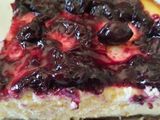 Cheesecake con coulis de arándanos