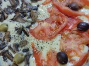 Una foto de pizza con salvado de trigo