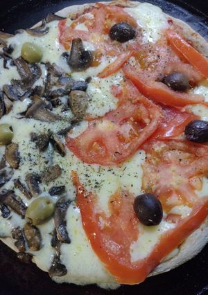 Una foto de Pizza con masa multicereal