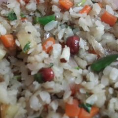 A picture of Chirer Pulao (Bengali style poha or flattened rice).