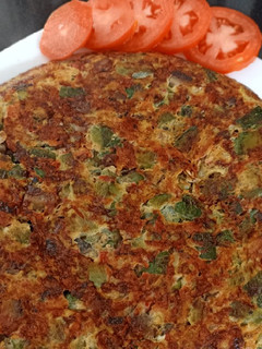 Una foto de Tortilla de vegetales y champiñones