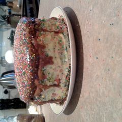 A picture of Home Made (from a cake mix) Rainbow Cake.