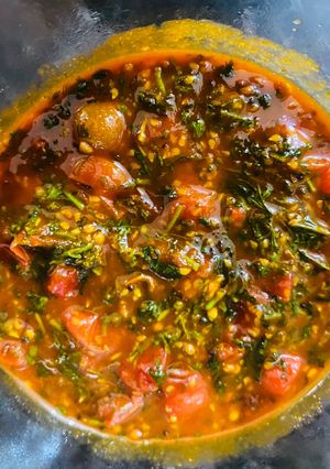 A picture of Baby tomato shaak (curry).