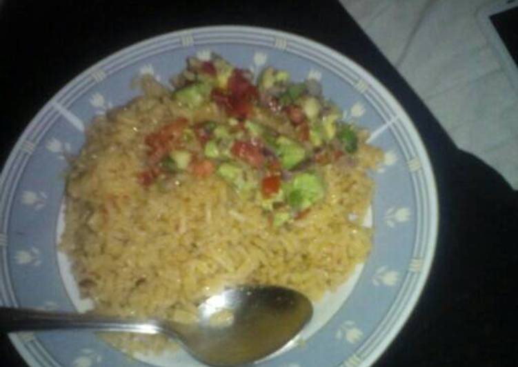 Rice with avocado and tomato salad