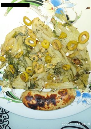 Une photo de Boudin blanc / fenouil et olives vertes dénoyautées au four