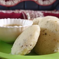 A picture of Quick rava idli with leftovar daal sambhar.