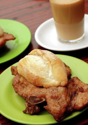A picture of Pork Chop Burger (猪扒包).