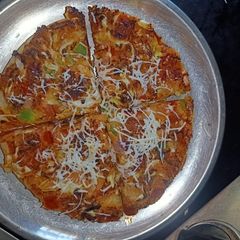 A picture of Delicious Pizza.