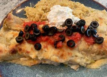 Popular Cuisine Chicken enchiladas with green chili cream sauce Savory Delicious
