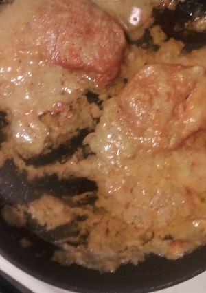 A picture of Smothered pork chops.