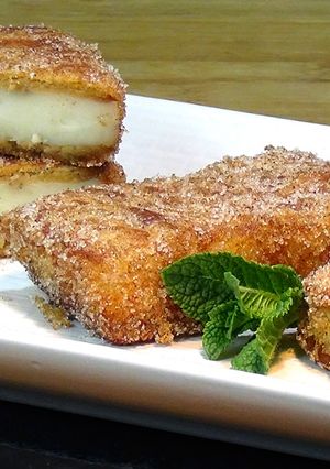 Foto principal de Leche frita con galletas, dulce típico de Semana Santa y fiestas tradicionales