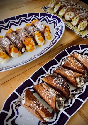 Una foto de Cannoli sicilianos