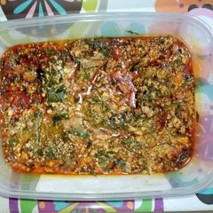 A picture of Egusi and ukazi soup.