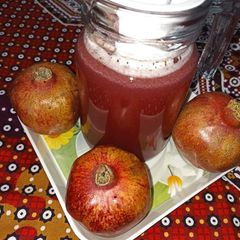 A picture of Fresh pomegranate juice.