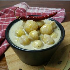 A picture of Baby Potato In Coconut Milk.