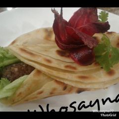A picture of Whosayna’s Seekh Kebab Paratha Rolls.
