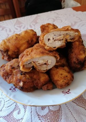 Medve sajttal. Baconnal, lilahagymával, töltött bundás karaj recept fotója