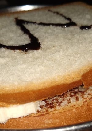 A picture of PBC peanut,banana, chocolate SANDWICH.