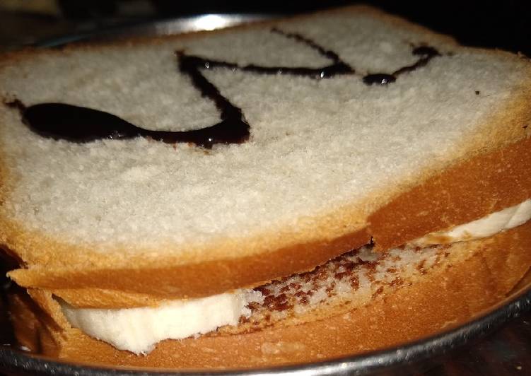 Steps to Prepare Ultimate PBC peanut,banana, chocolate SANDWICH