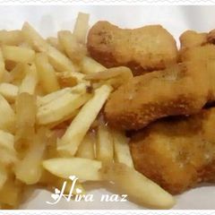 A picture of Chicken Cutlets with French Fries.
