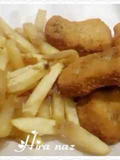 A picture of Chicken Cutlets with French Fries.
