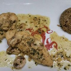 A picture of Sauted Adobo, garlic, mushroom chicken.