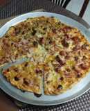 Pizza mixta hawaiana y variedad de carnes