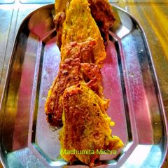 A picture of Kakharu Phula Bhaja Pumpkin flower masala fry.