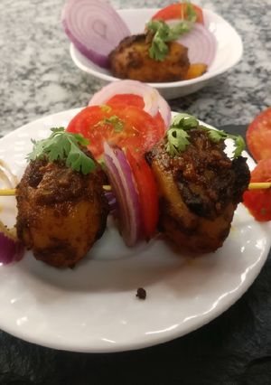A picture of Dum Aalu in tamarind paste.