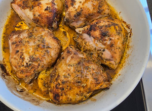 A picture of Greek oven bake chicken (with potatoes).