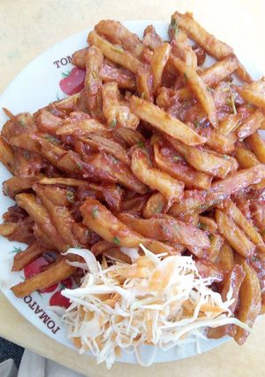 A picture of Homemade Chips Masala with Salad.