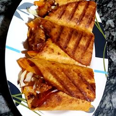 A picture of Cheesy chicken tortillas.