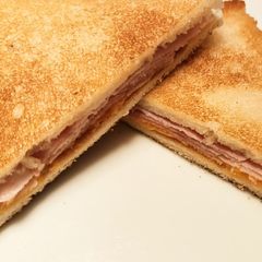 A picture of Ham, cheddar and HP brown sauce fried toastie.