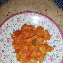 A picture of Potato Karahi with plain Roti.