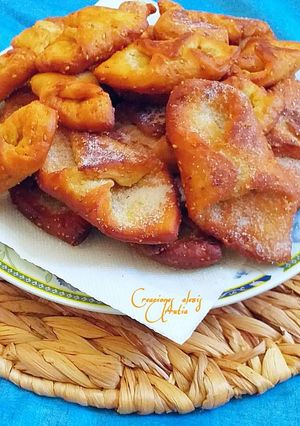 Una foto de Pestiños de limón y naranja con Canela infusionada en cítricos