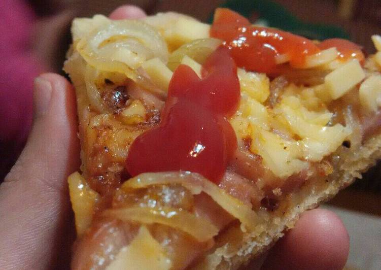 Bagaimana Menyiapkan Pizza Pan Garing di Luar Lembut di Dalam yang Lezat