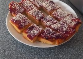Jam and Coconut traybake