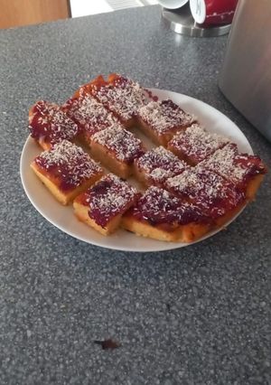 A picture of Jam and Coconut traybake.