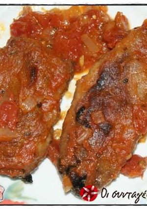A picture of Soutzoukakia with chickpeas.