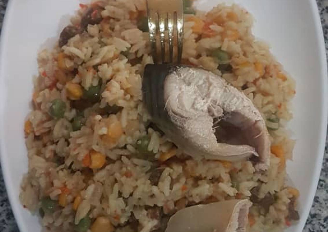 Concoction rice and boiled fish