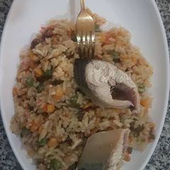 Concoction rice and boiled fish A picture of Concoction rice and boiled fish.