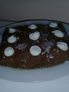 Una foto de Postre de vainillas al café con crema de chocolate y merenguito