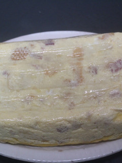 Una foto de Pastel salado de pan y leche con jamón