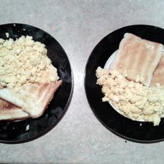 A picture of toast 'N' scrambled egg.
