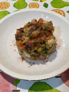 Una foto de Verduras y jamón serrano al vapor con tulsi