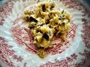 Una foto de risotto berenjena