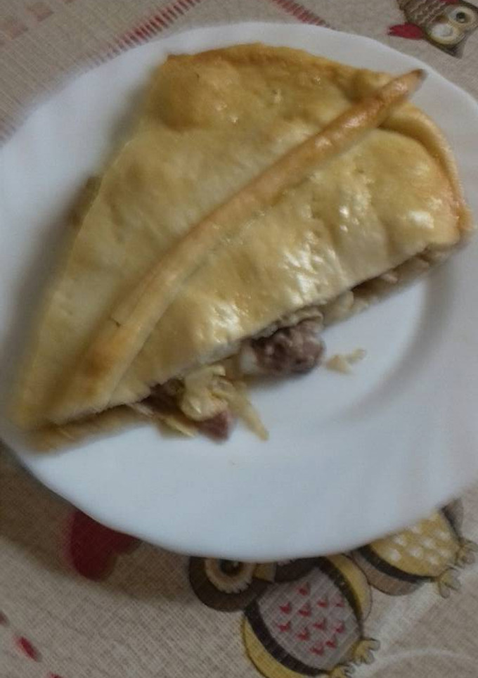 Una foto de Empanada rellena carne y verduras
