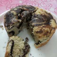 A picture of Eggless marble cake in cooker.