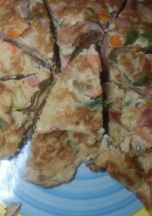 A picture of Fried egg with vegetable.