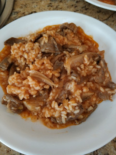 Una foto de Arroz con setas y presa ibérica